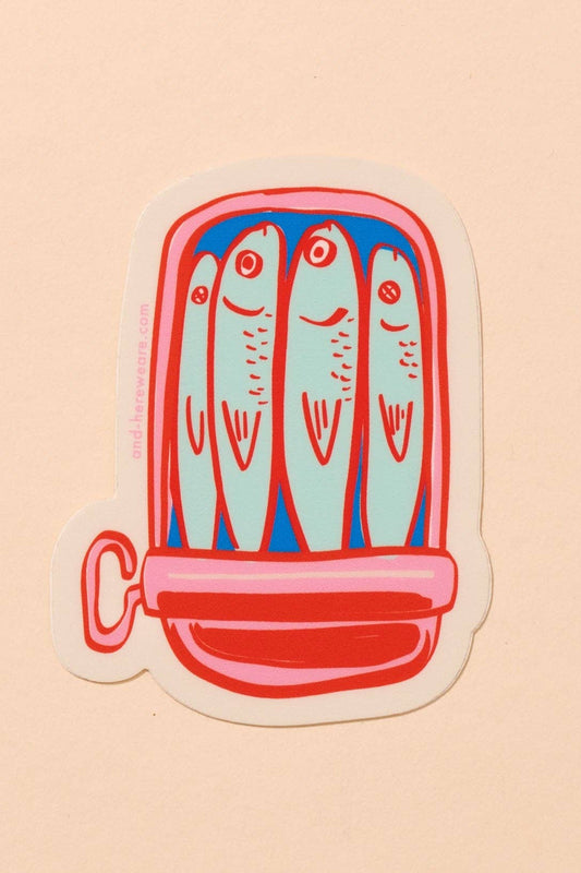 Die-cut vinyl sticker depicting a colorful illustration of sardines in a tin can, featuring artwork by Meghan Hopkins Sokor. The sticker measures approximately 3 inches, is waterproof, durable, and suitable for outdoor use.