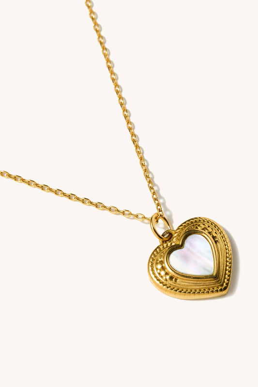 adele white heart necklace