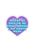 Heart-shaped sticker with text 'Please be nice to me even though I am sorta mean' on a white background
