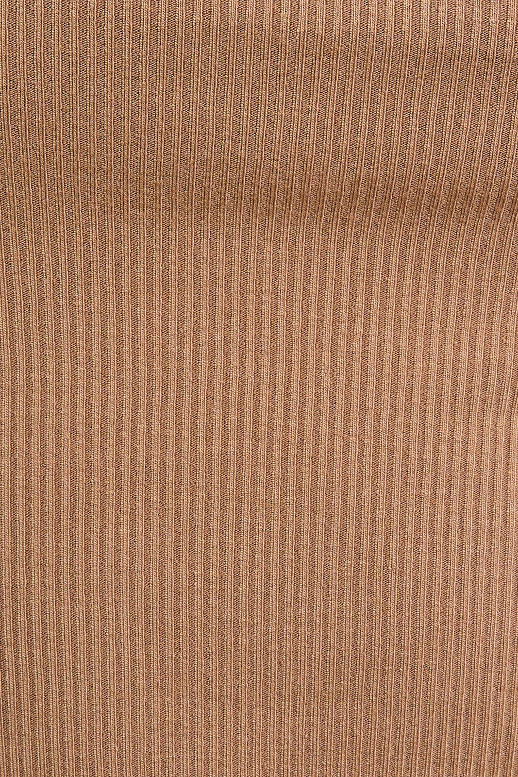 Close-up of brown ribbed fabric texture