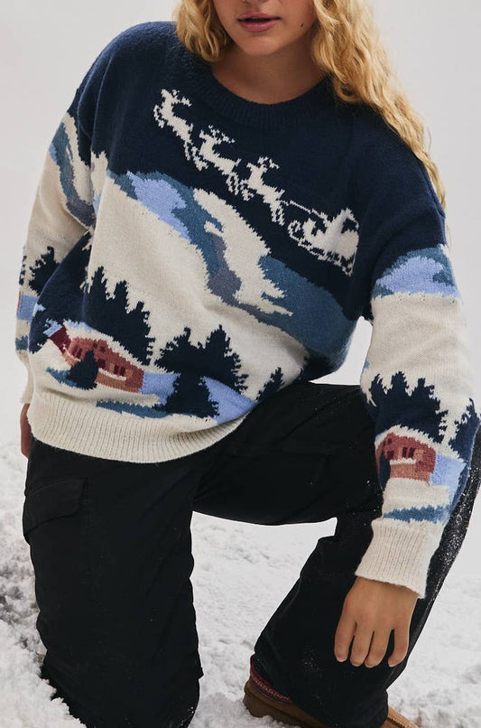 Person wearing a patterned sweater and hat in a snowy setting