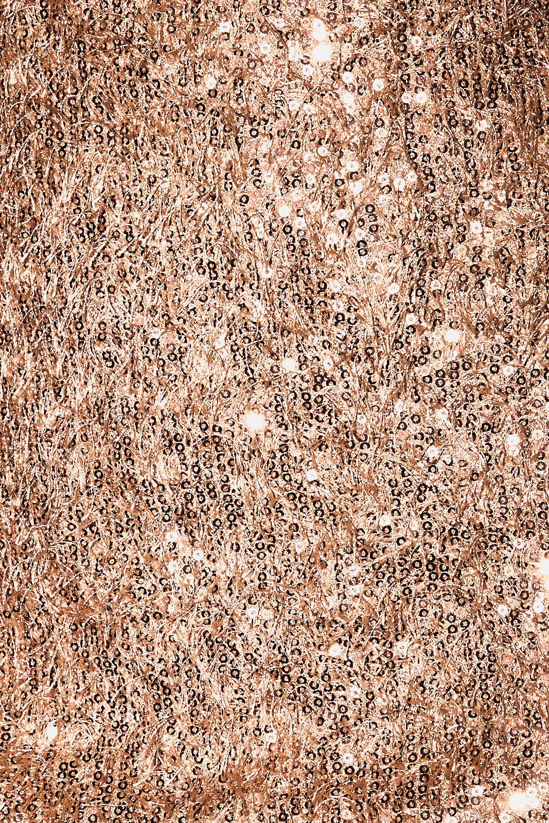 Close-up of a textured brown surface with a subtle pattern