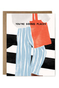 Card with illustration of a person wearing an orange shirt and blue striped pants, with text 'You're Going Places' on a black and white striped background.