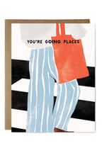 Card with illustration of a person wearing an orange shirt and blue striped pants, with text 'You're Going Places' on a black and white striped background.