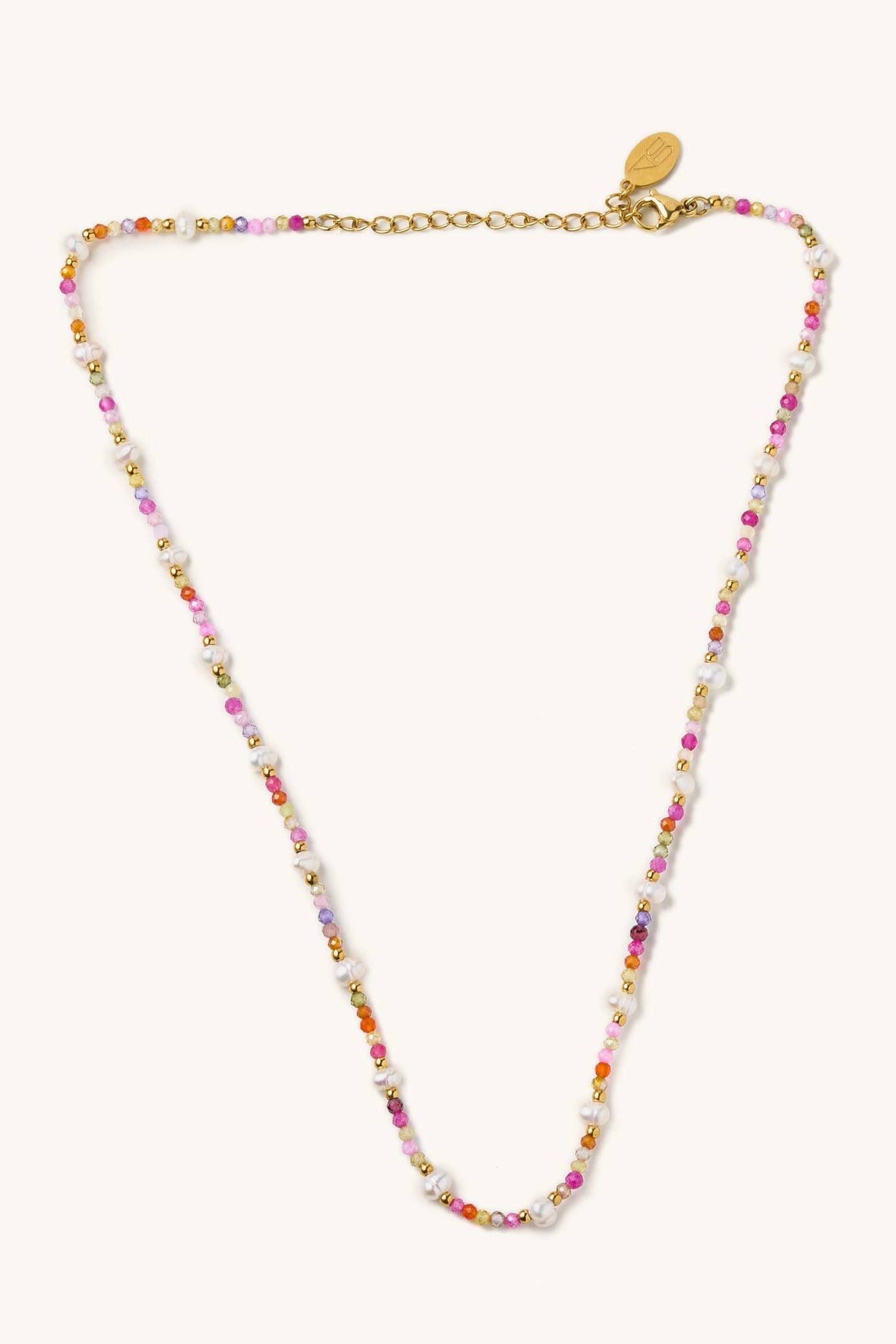 Multicolored beaded necklace on a white background