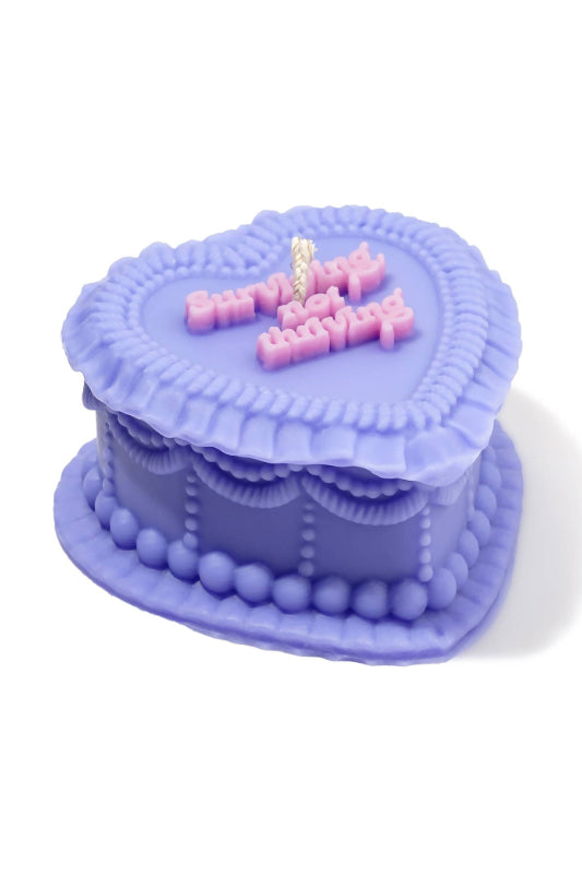 heart cake candle - surviving, not thriving