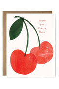 Card with red cherries and a green leaf on a white background