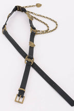 Black leather belt with gold hardware on a white background