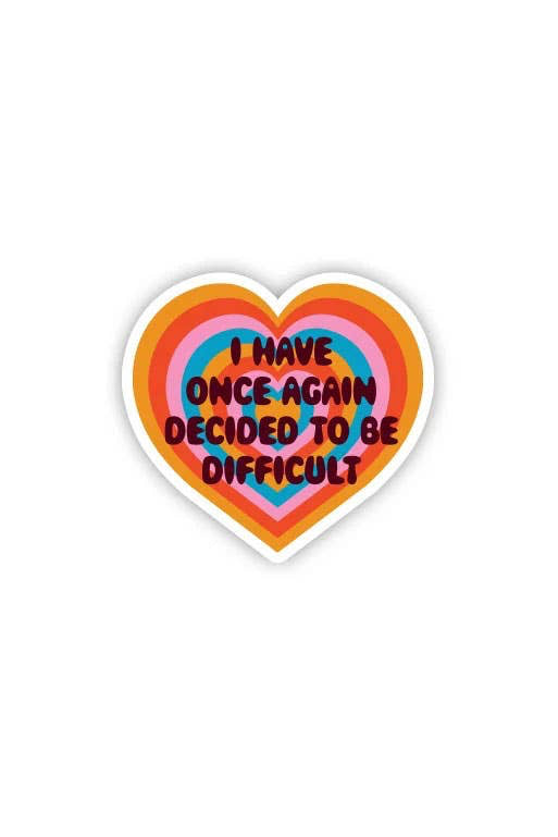 Heart-shaped sticker with colorful design and text on a white background