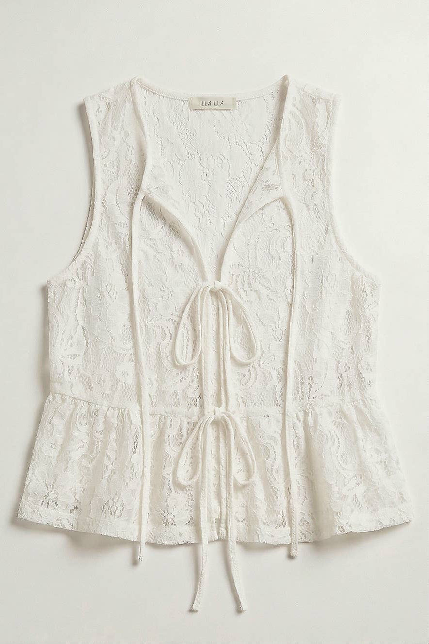 White lace sleeveless top on a light gray background