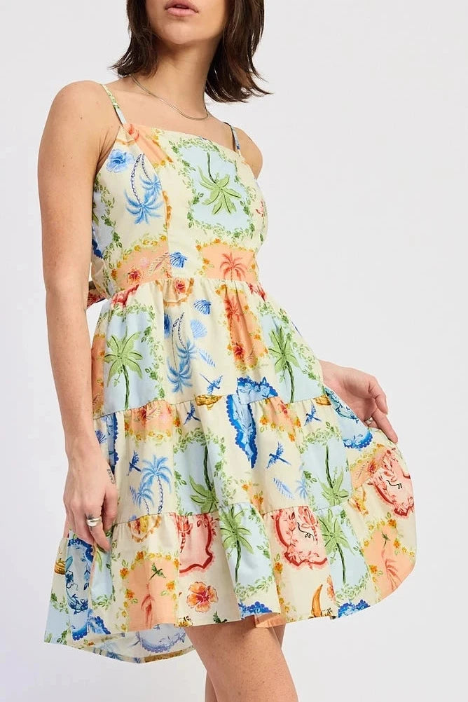 Woman wearing a colorful floral dress on a white background