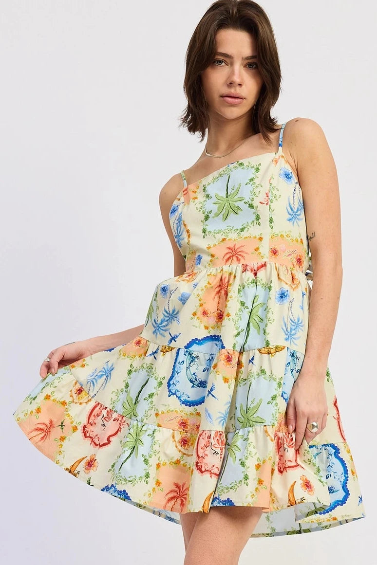Woman wearing a colorful floral dress on a white background