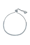 Silver bracelet with clear stones on a white background