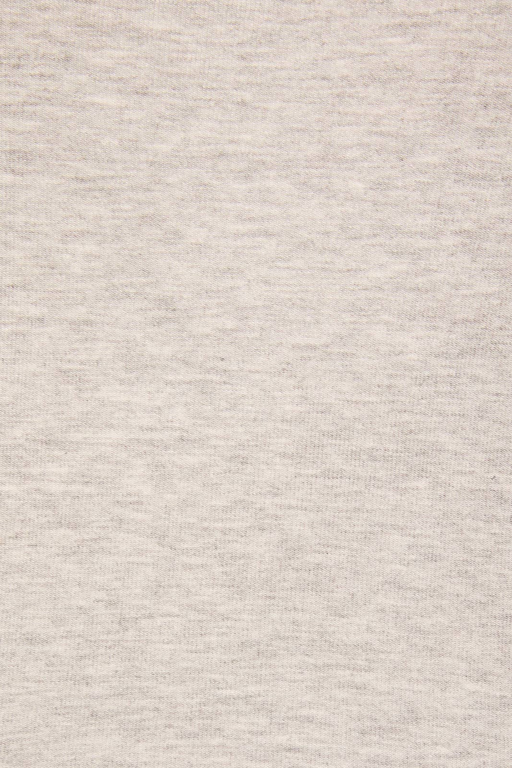 A close-up of a light heather gray fabric texture, showing the fine knit pattern and subtle gray and off-white flecks.
