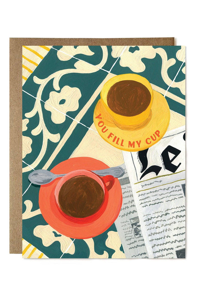 Greeting card with two coffee cups and a spoon on a decorative background