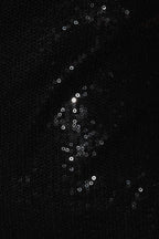 close up of black sequin dress