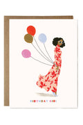 Greeting card with illustration of a woman in a floral dress holding balloons and 'Birthday Girl' text.