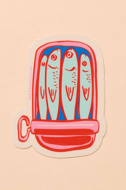 Die-cut vinyl sticker depicting a colorful illustration of sardines in a tin can, featuring artwork by Meghan Hopkins Sokor. The sticker measures approximately 3 inches, is waterproof, durable, and suitable for outdoor use.