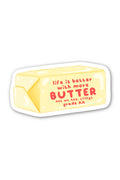 Sticker of a butter block with 'life is better with more butter' text on a white background
