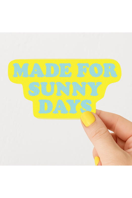 Hand holding a yellow sign with 'MADE FOR SUNNY DAYS' text on a white background